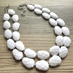 "Bright & fun White statement necklace! Faceted, white cushion cut acrylic beads.  I had customers tell me for years they wanted a \"bright white\" to have contrast with certain outfits - this is the one I always recommend for that! Necklace: 16\" necklace with a 4\" extender chain. Earrings: 1.5\" drop. Thank you for supporting American small business :) *Smoke and pet free home!* I ship 6 days a week!  Thank you for browsing my store, Check out my other items!" Beaded Necklace White, White Beaded Necklace, White Beaded Necklaces, Jewelry White, White Cushions, Necklace White, White Necklace, White Jewelry, Summer Jewelry