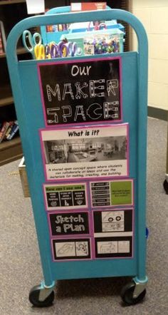 a blue and pink cart with writing on it that says, our maker race what is life?