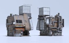 two large metal structures sitting next to each other on top of a white surface,