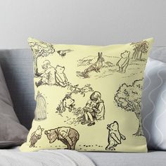 winnie the pooh throw pillow sitting on a couch