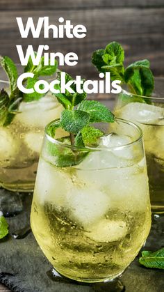 white wine cocktails with mint garnish in glasses on a slate serving tray