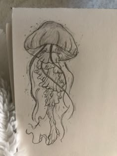 a drawing of a jellyfish on a piece of paper