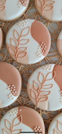 decorated cookies in the shape of leaves and hearts