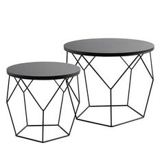 two black tables sitting next to each other