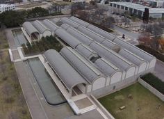 an aerial view of a train station in the city