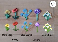 flowers made out of perler beads are displayed on a wooden surface with the words, dandelion, blue orchid, azure blue poppy, and allium