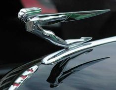 the hood ornament of a classic car