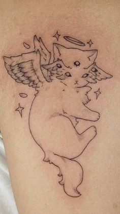 an angel cat tattoo on the back of a woman's left arm and shoulder