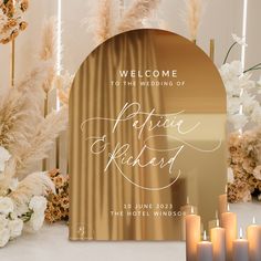 a welcome sign with candles and flowers in the background for an elegant wedding ceremony at the hotel windsor