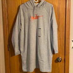 Nike Nwt Hoodie Dress With Side Pockets Can Fit Up To Xxl Because Loose Fit. I Wear Xxl Preferably But I Already Own 2 Of These So I’m Selling This One. Nice & Cozy For Those Chilly Summer Nights Or Beach Coverup. No Low Ball Offers Please - Poshmark Takes A Lot For Us Sellers Thank You For Understanding! I Do Consider Reasonable Offers! All Sales Are Final. Please Ask Questions Prior To Sale. Thank You For Shopping My Closet! Nike Dress, Nike Dresses, Hooded Dress, Hoodie Dress, Summer Nights, Comfy Outfits, Nike Women, Loose Fitting, Cover Up