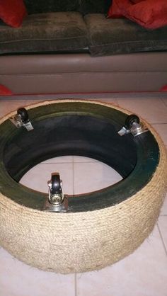 a dog bed made out of an old tire