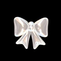 a clear plastic bow on a black background