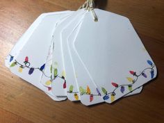 Set of 10 original watercolor ornament gift tags. Each tag is hand painted. Tags are blank on the back for your holiday message. Each tag has a gold and white string attached to tie onto your gift or package. Diy Gift Name Tags, Watercolour Christmas Gift Tags, Paper Tags Ideas, Gift Tags Diy Handmade, Christmas Gifts Wrapped, Watercolor Christmas Tags, Watercolor Christmas Gift Tags, Christmas Ornament Watercolor, Christmas Gift Tag Ideas