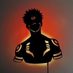 the silhouette of an anime character against a red and orange background with light coming from behind