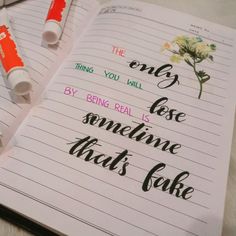 an open notebook with writing on it and two markers next to the book that says, the only thing you will be by being real is someone that's fake