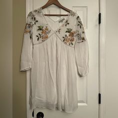 Jodifl White Floral Bohme Medium Aztec Boho Dress $98 Anthropologie White Floral Print Bohme Medium Aztec Boho Dress $98 Anthropologie Purchased From A Boutique. No Tag. New Without Tags. Super Soft Material. Pet And Smoke Free Home! I Have Tons Of Cute Stuff Listed. I Will Bundle! Chest Measures Laying Flat Across From Armpit To Armpit 19” Length 35” ***************** If You See Other Items Listed You Like, I Can Bundle! Just Click Add To Bundle On Every Item You Like And I Can Submit You One O Floral Embroidered V-neck Midi Dress For Vacation, Casual Floral Embroidered Dress For Spring, Casual Floral Embroidery Dress For Spring, Casual Spring Dress With Floral Embroidery, Spring Vacation Boho Fitted Dress, Flowy V-neck Mini Dress For Daytime, Fitted Boho Dress For Spring Vacation, Fitted Boho Dress For Spring, Flowy Boho Dress For Spring Day Out