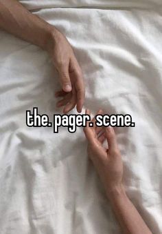 two hands touching each other on top of a white sheet that says the pager scene