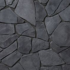 an image of a stone wall that looks like it is made out of rocks