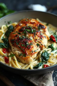 Pasta dish with creamy sauce, topped with grilled chicken, spinach, and red peppers. Fancy Chicken Dishes, Chicken Veggie Recipes, Unique Chicken Recipes, Chicken Florentine Pasta, European Dinner, Chicken Florentine Recipe, Florentine Recipe, Florentines Recipe, Weekly Dinner Menu