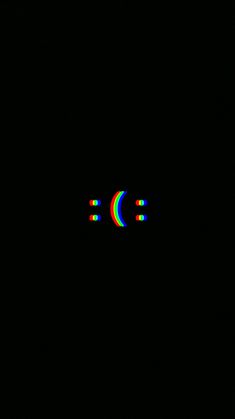 an image of a black background with rainbows in the middle and two circles at the bottom