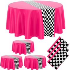 pink table cloths and black and white checkered napkins on top of a round table