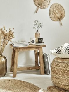 a living room filled with lots of furniture and decor