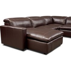 a brown leather sectional sofa with recliners on it's sides and footstools