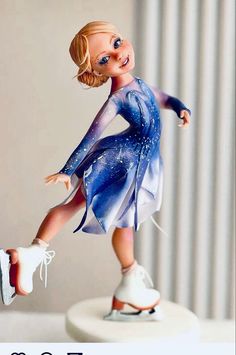 a figurine of a girl on a skateboard