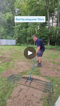 a man using a lawn mower in the yard