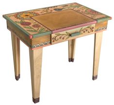 a small wooden table with colorful designs on it