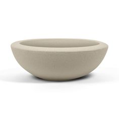 a white bowl sitting on top of a table