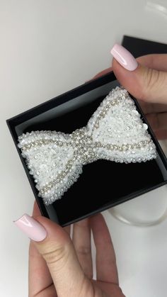 ◼ Add a special touch to your look with the Rhinestone Crystal Bow hair clip. This stunning hair accessory is handcrafted and embellished with sparkling crystals, beads and pearls.  Whether you're walking down the aisle as a bride, standing by as a bridesmaid, or attending a special event, this versatile hair clip will effortlessly complete your look with elegance and charm. Going beyond just styling your hair, this hair clip can serve as a stunning brooch. Pin it to your jacket for a sophisticated look, adding a personalized touch to your look. ◼ SIZE Hair clip: 8,5 cm x 5,5 cm (3,3 inch x 2,2 inch) Hair clip with packed: 9 cm x 8,5 cm x 5,5 cm (3,5 inch x 3,3 inch x 2,2 inch)  ◼ You can change the size or color of the hairpin, email me and we'll discuss the details. ◼ You can email me an Rose Hairpin, Crystals Beads, Rhinestone Hair Pin, Bow Hair Clip, Belly Dance Costumes, Just Style, Rhinestone Wedding, Crystal Ab, Bow Hair