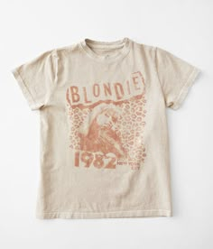 Girls - Goodie Two Sleeves Blondie 1982 Band T-Shirt - Brown X-Small Oxfordtan Foiled Photo Real graphic washed t-shirt Body length 20 1/2 on size medium. 100% Cotton. Machine wash cold with like colors. Non-chlorine bleach when needed. Tumble dry low. Low iron if needed. Do not iron decoration.. GIRLS' TOP SIZE CONVERSION CHART Top Sizes XXS XS S M L XL Girls' Sizes 5 6-7 8 10 12 14-16 Chest 25-25 1/2 26-26 1/2 27-27 1/2 28-28 1/2 29-29 1/2 30-30 1/2 *Conversion sizes may vary. Measurements bas Blondie T Shirt, Vintage Band T Shirts, Vintage Band Tees, 90s Shirts, Iron Decoration, Xl Girls, Conversion Chart, Band Merch, Vintage Band