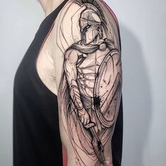 a man with a clock tattoo on his arm