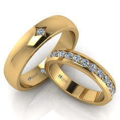 two gold wedding rings with diamonds on each one, set in 18k yellow gold