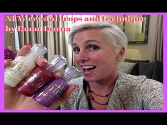 a woman holding three bottles of lip glosses in front of her face with the caption ny crystal drops and technique by benom dona