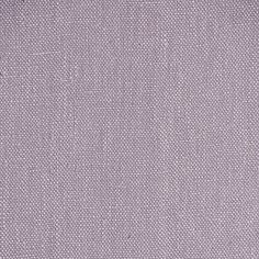 a close up view of a purple fabric textured with small dots and lines,