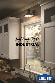 the words lighting style industrial are in front of a kitchen sink and window with white cabinets