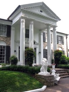 a large white house with columns on the front