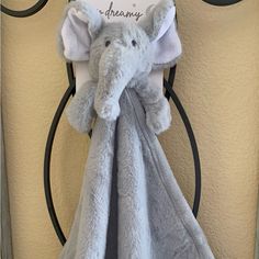 an elephant towel hanging on the front door