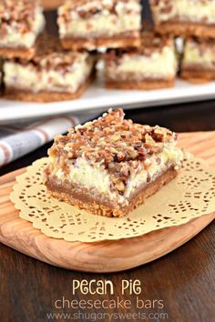 a piece of dessert sitting on top of a wooden plate