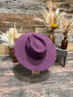 Plum Felt Hat Its classic design makes it the ideal accessory for any occasion, allowing you to easily dress it up or down to suit your style. Experience the perfect blend of sophistication and versatility with our Rancher Felt Fedora Hat, your go-to choice for enhancing your wardrobe. Featuring a sewn-in sweatband with a unique hidden pull strap tightening system for a one of a kind fit! Plus we’ll include two adhesive size reducers for an even more custom experience. Brim Measures 3 1/2" Crown American Hat Makers, Short Uggs, Western Boots For Men, Felt Fedora, Boot Jewelry, Work Boots Men, Felt Hat, Fedora Hat, Bell Bottoms