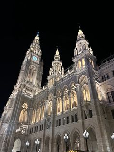 an ornate building lit up at night