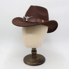 Elevate your boho chic style with our Western Style Cowboy Hat featuring a trendy leather band adorned with a bold bull detail. Crafted for both fashion and function, this hat effortlessly merges bohemian flair with classic cowboy charm, making it the perfect accessory for any free-spirited wardrobe. Specs: Material: Polyester Casual Brown Hat Bands For Rodeo, Western Style Brown Fedora Felt Hat, Western Brown Fedora Felt Hat, Brown Felt Hat For Summer Rodeo, Trendy Brown Fedora For Rodeo, Trendy Fedora Hat Bands For Ranch, Country Style Brown Felt Hat For The Beach, Western Style Brown Felt Hat For The Beach, Western Brown Felt Hat For Beach