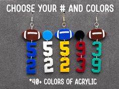 four different colors of acrylic earrings with footballs and numbers on them in the shape of letters