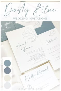 the wedding stationery is laid out on top of each other