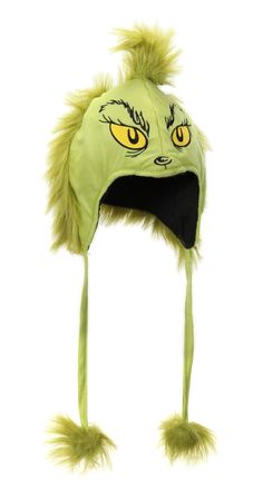 a green hat with yellow eyes and long hair on it's side, in the shape of an angry grin