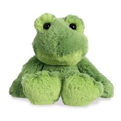 a green frog stuffed animal sitting up against a white background