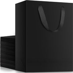 a black shopping bag sitting on top of each other