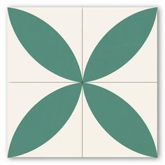 a green and white tile with four leaves on it